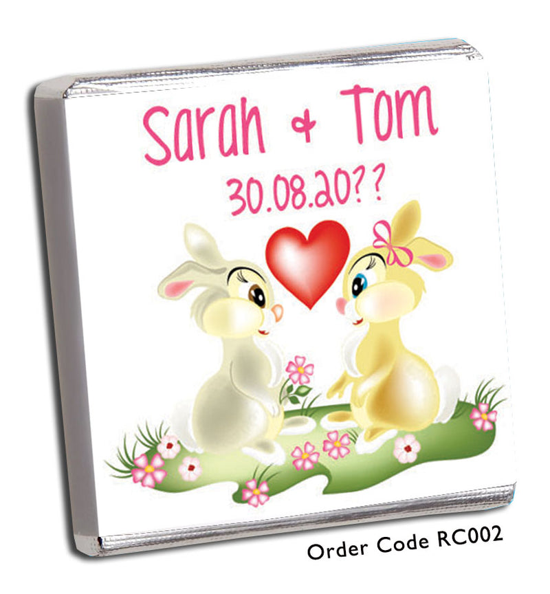 two rabbits with red heart on wedding favour