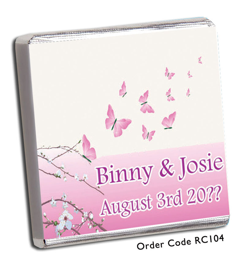 pink butterfly with flowers wedding favour