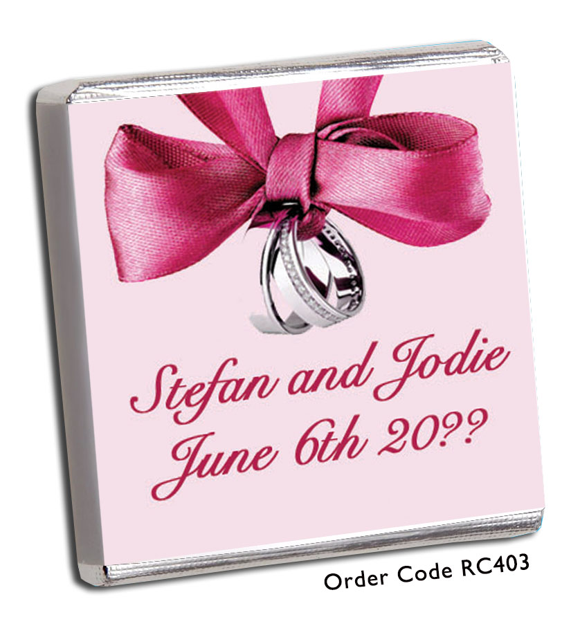 pink ribbon and silver bands wedding favour