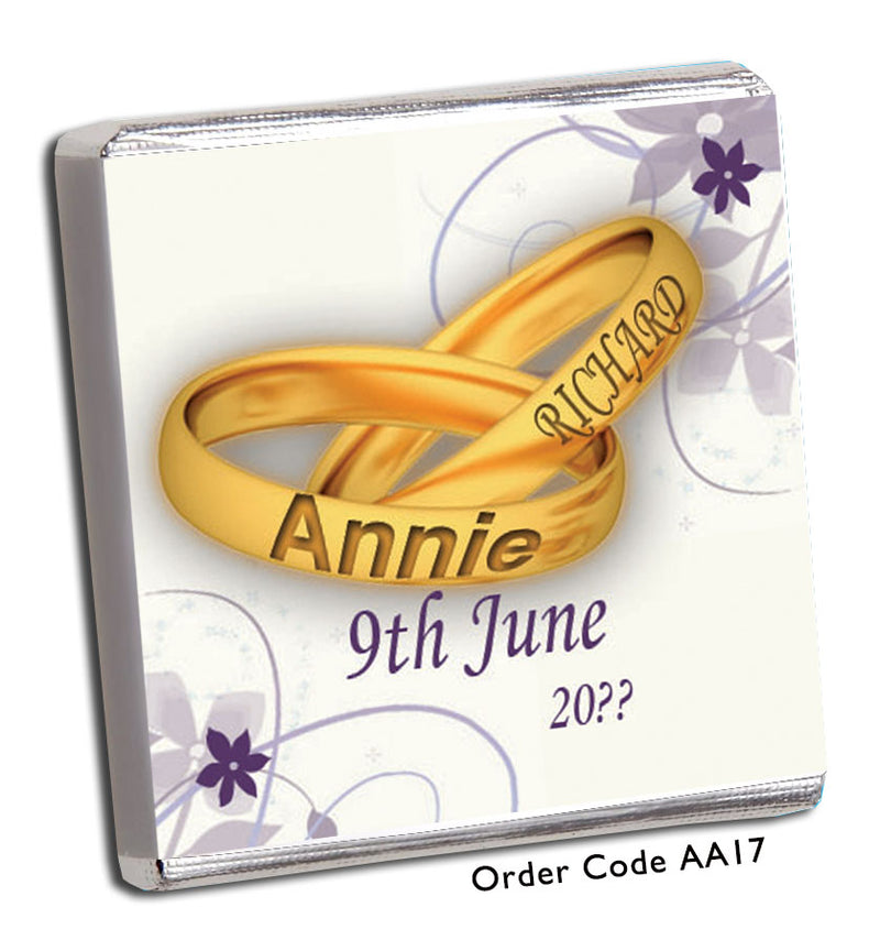 gold rings with purple flower background