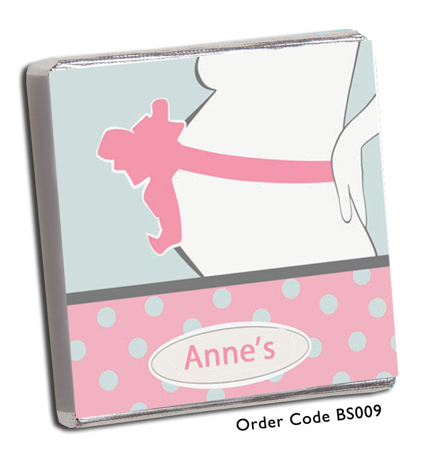 silhouette of pregant lady's tummy with pink bow