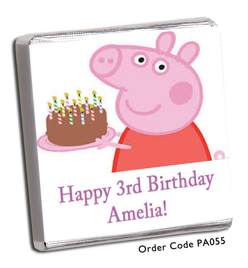 Peppa Pig carrying a birthday cake. 