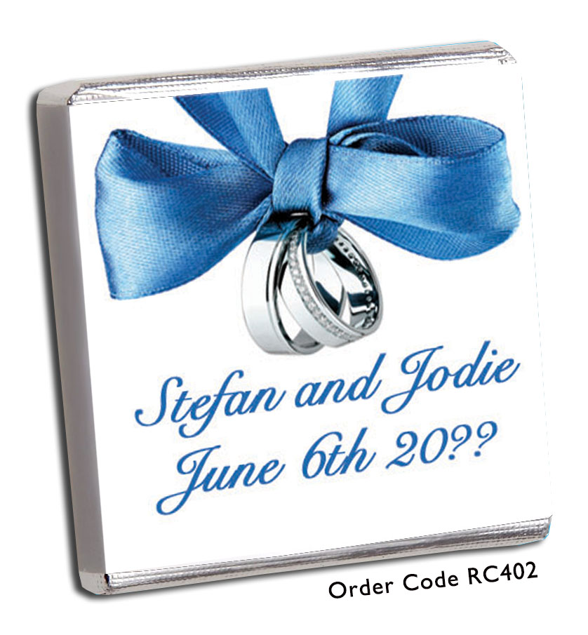 blue ribbon and silver wedding bands wedding favour