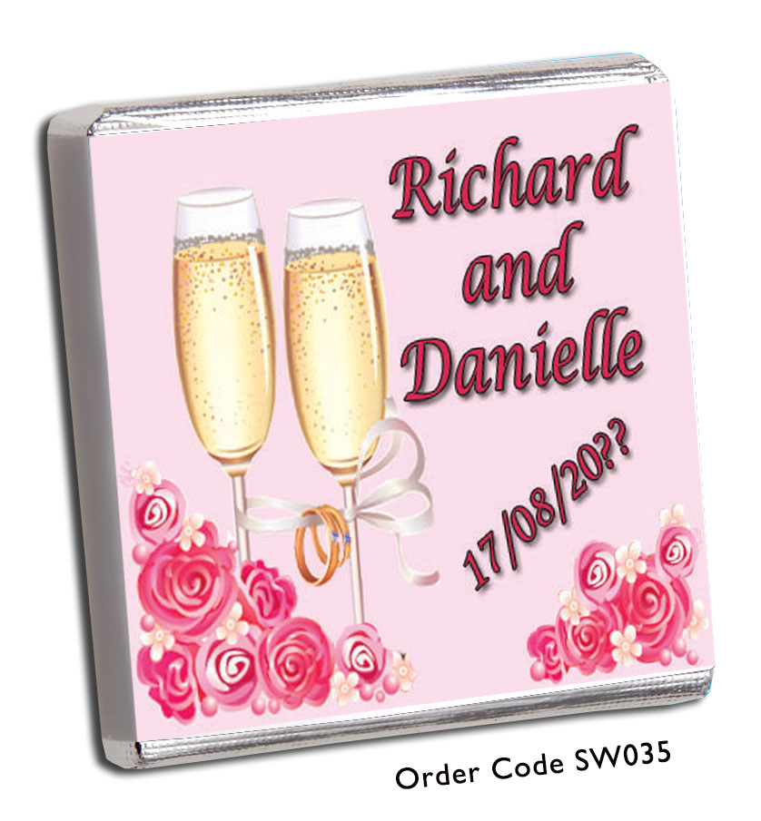 champagne glasses and roses wedding favour 